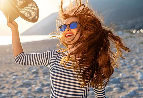 Как восстановить волосы после летнего солнца и моря?